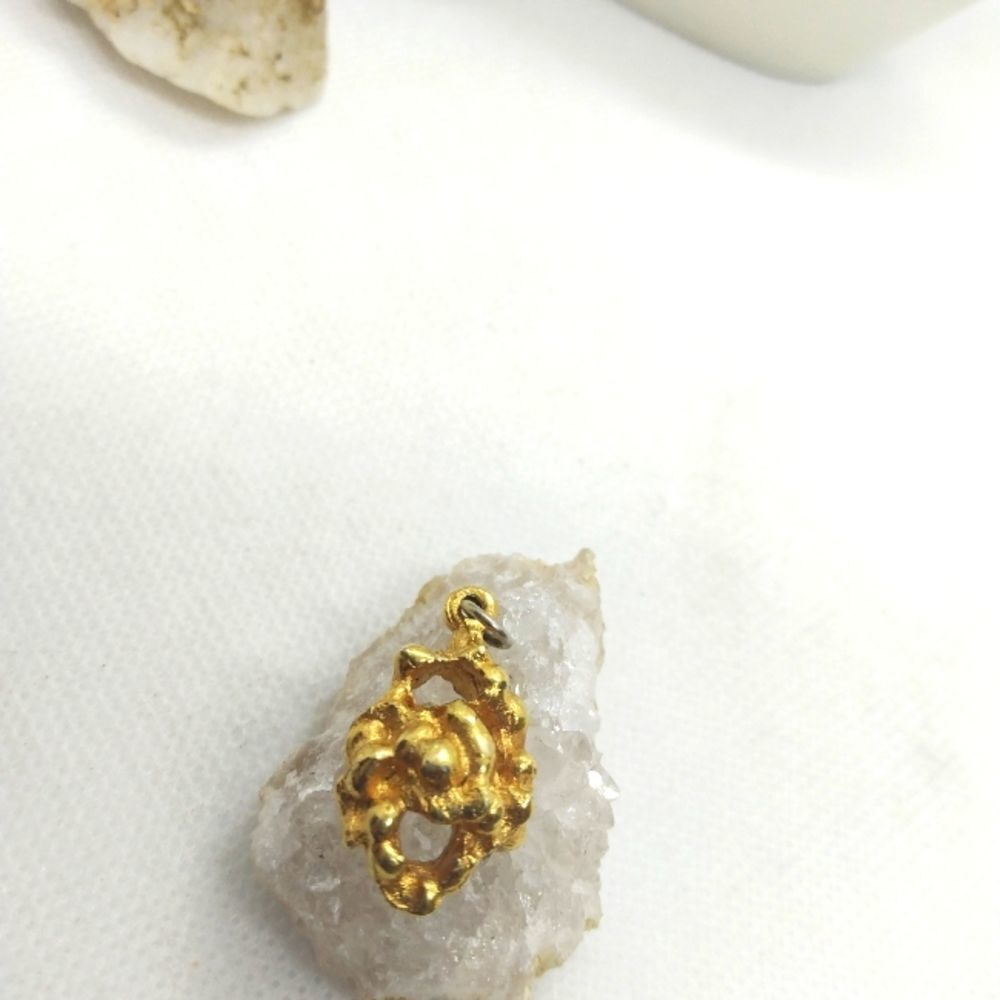 Gold nugget necklace pendant toned? Not tested